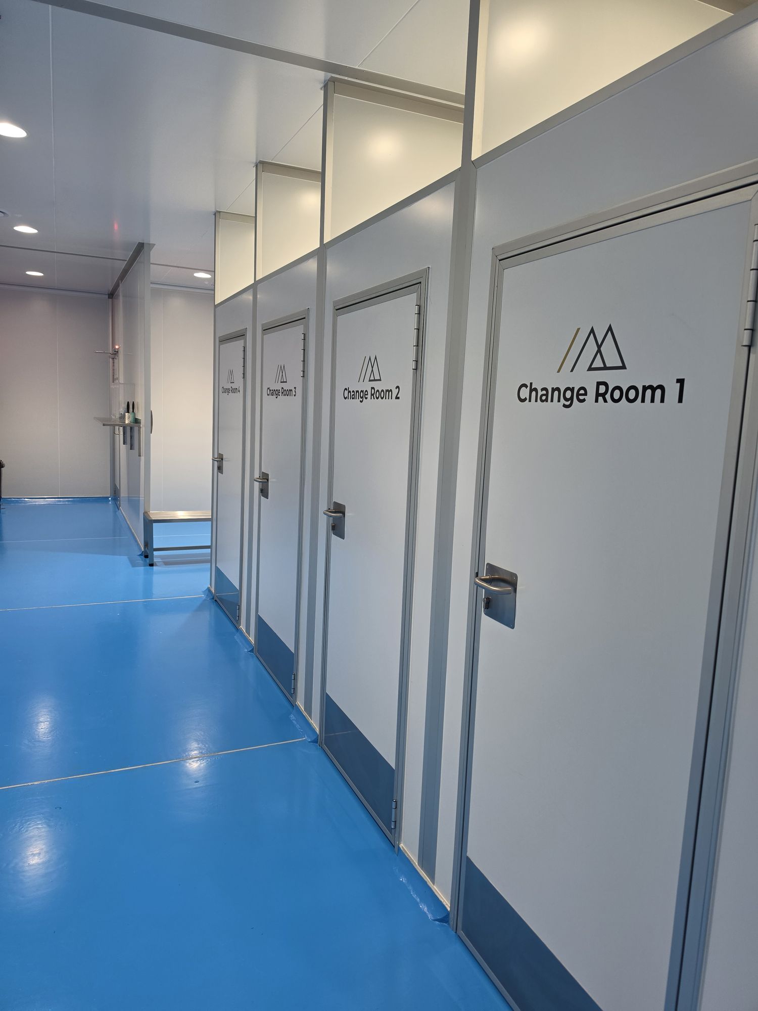 Corridor lined with change room doors